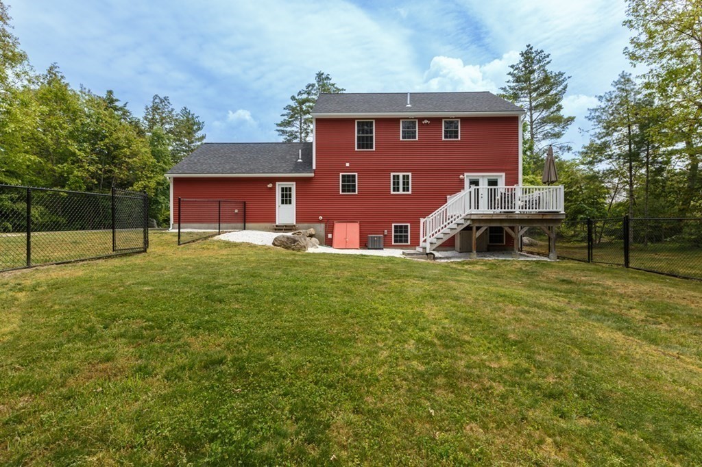 8 Ames Road Brookline, NH 03033 - Photo 25 of 26 a front view of a house with garden