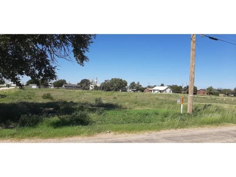 523 P Avenue Ralls, TX 79357 - Photo 2 of 5 a view of a lake with a big yard