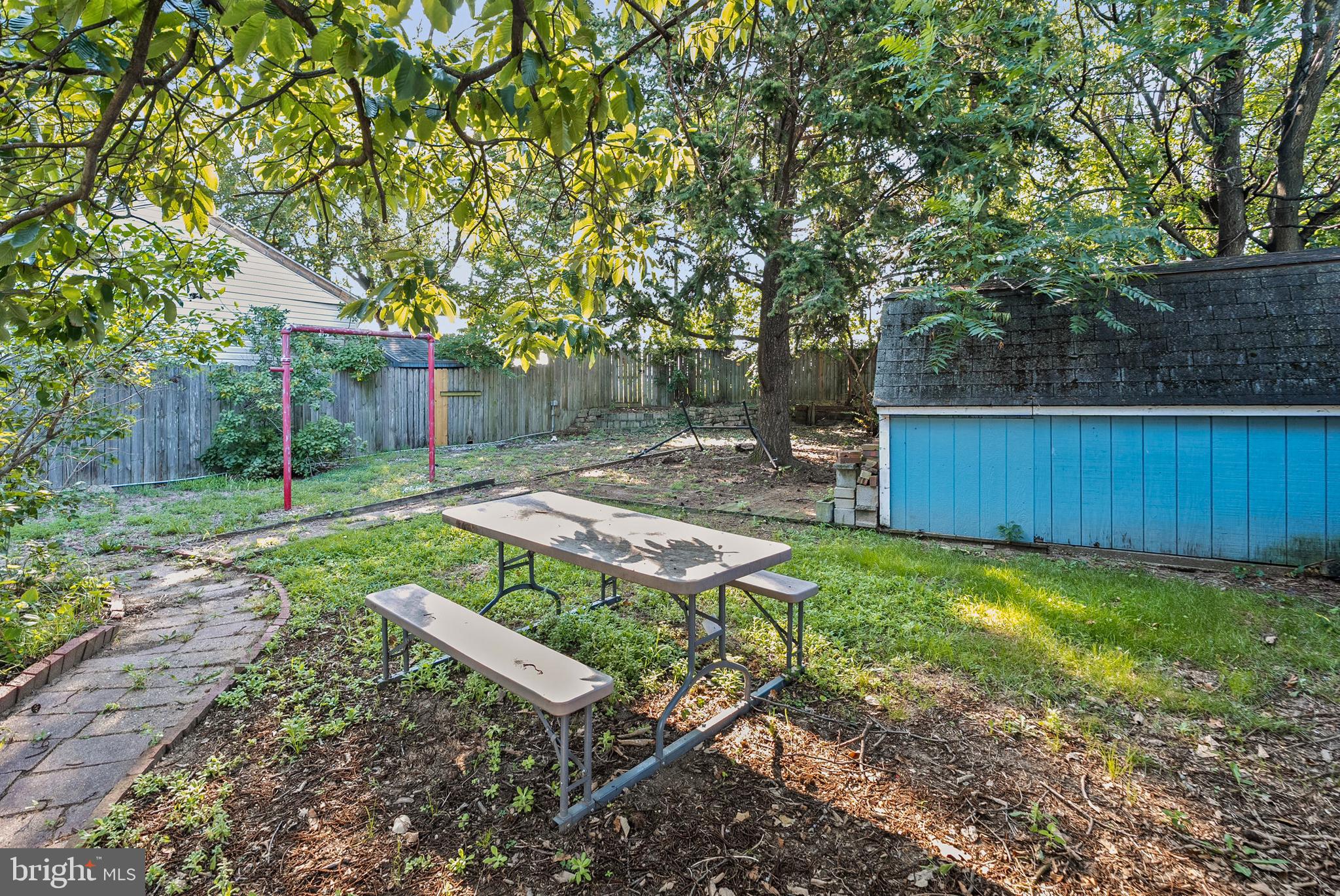 1866 Marshall Road Baltimore, MD 21222 - Photo 23 of 30 a view of a backyard with a tree