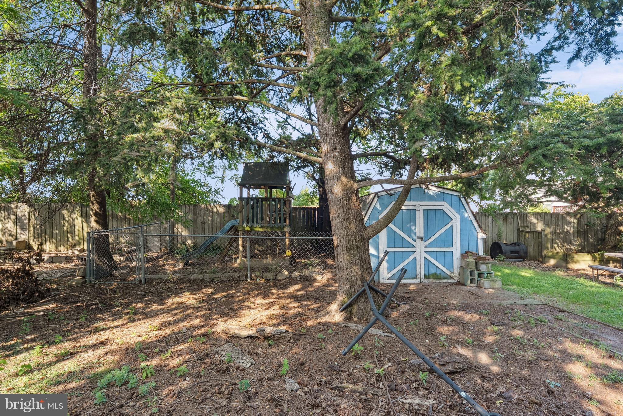 1866 Marshall Road Baltimore, MD 21222 - Photo 26 of 30 a view of outdoor space with garden and trees