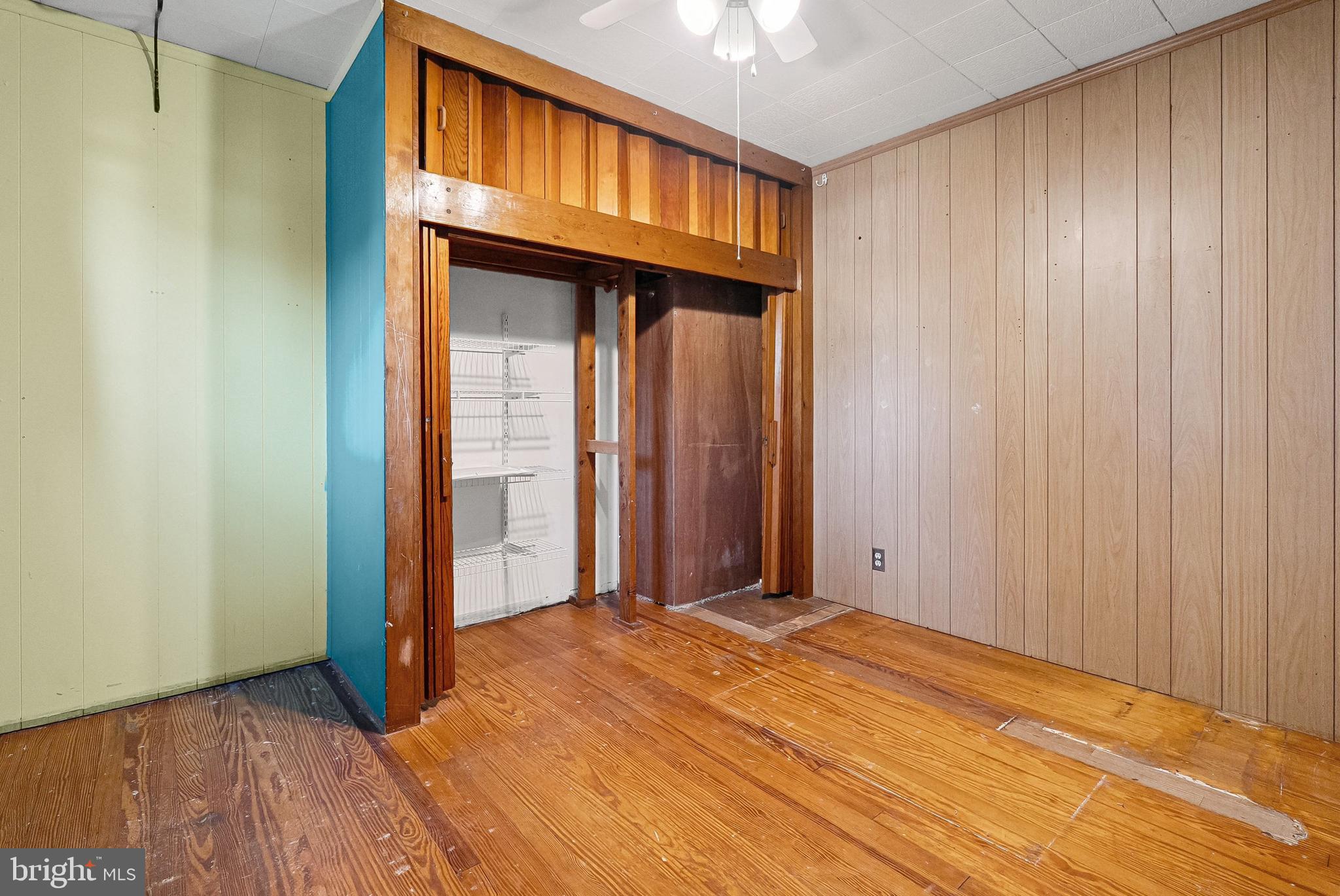 1866 Marshall Road Baltimore, MD 21222 - Photo 7 of 30 a view of a livingroom with wooden floor and a bathroom