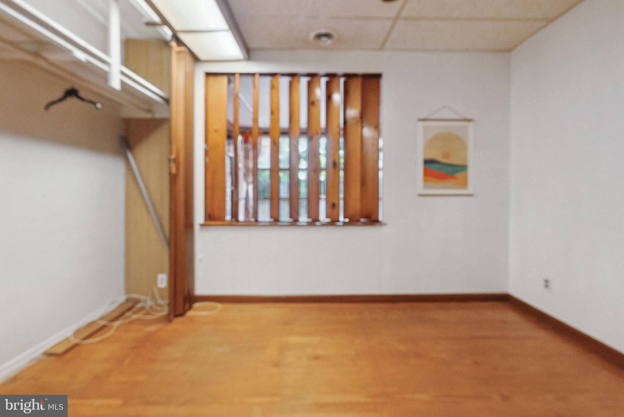 1866 Marshall Road Baltimore, MD 21222 - Photo 10 of 30 a view of an empty room with a window