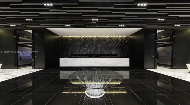 an aerial view of a house with a swimming pool