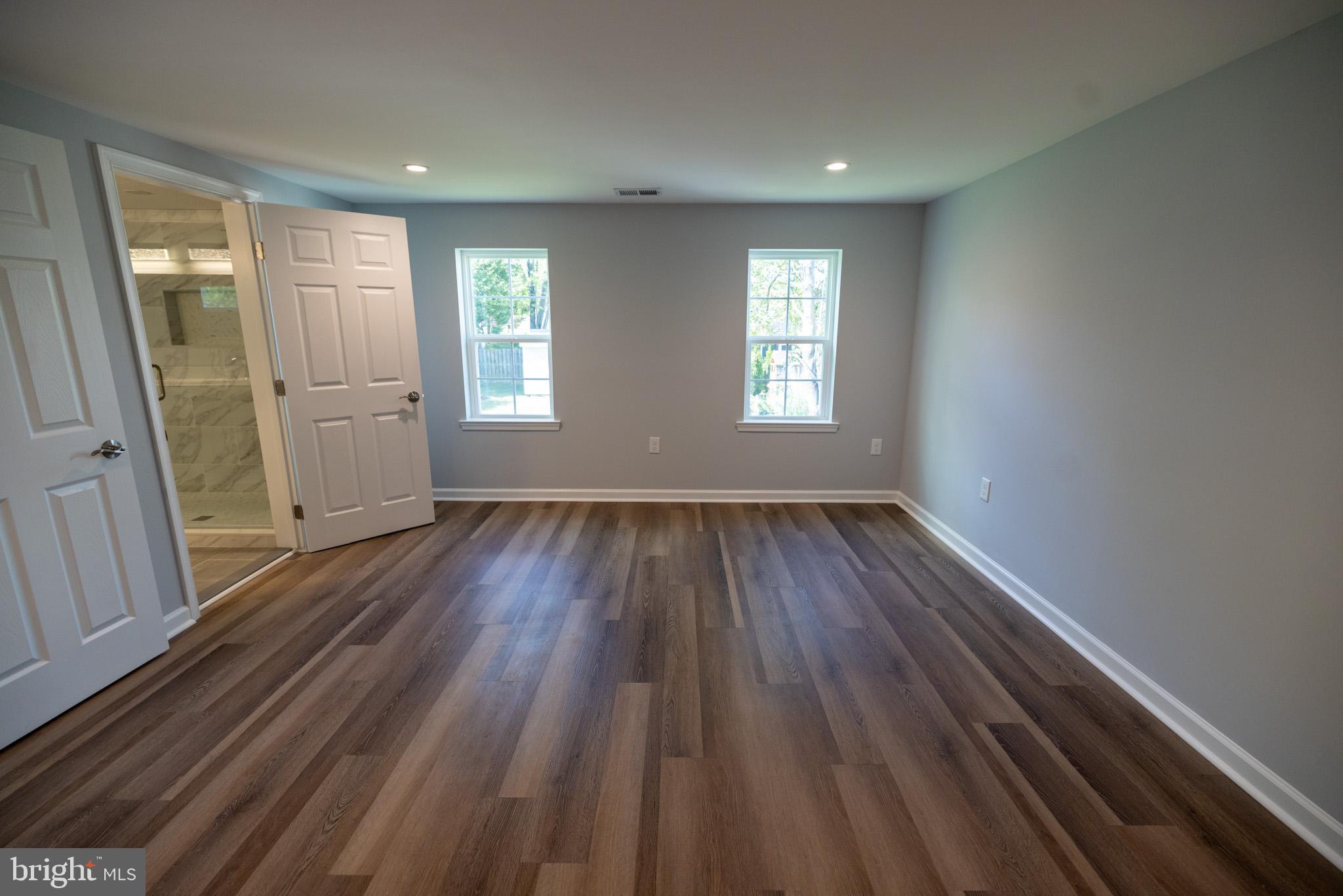 408 Blue Ridge Avenue Northeast Leesburg, VA 20176 - Photo 12 of 17 Master bedroom