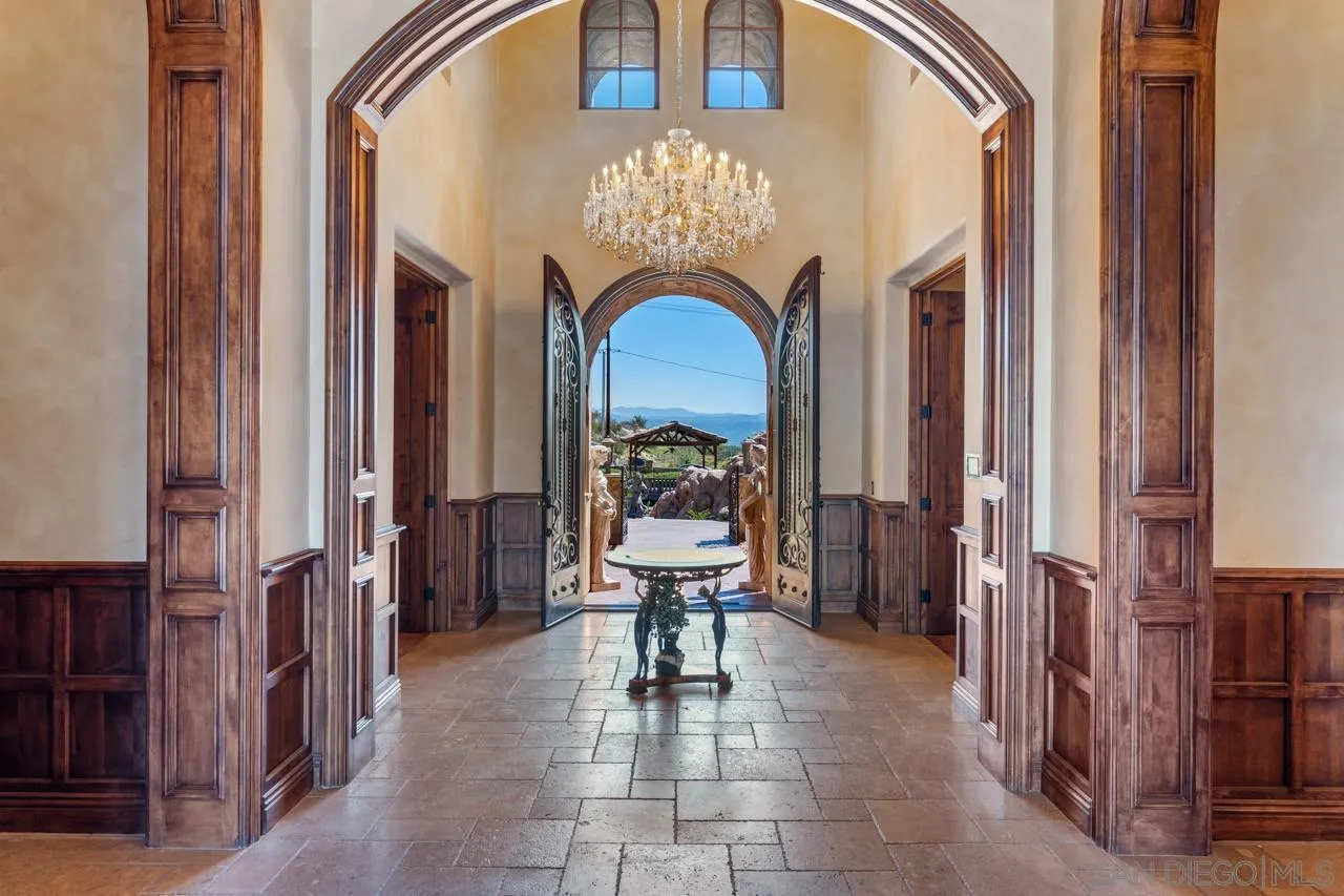19612 Rangeland Road Ramona, CA 92065 - Photo 11 of 65 a view of a hallway with furniture and entryway