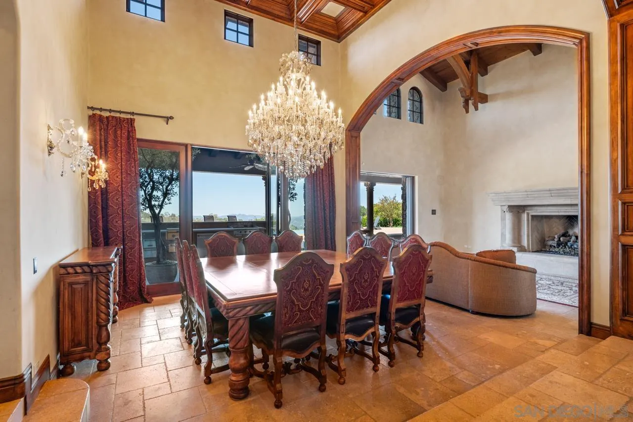 19612 Rangeland Road Ramona, CA 92065 - Photo 22 of 65 a view of a dining room with furniture and chandelier