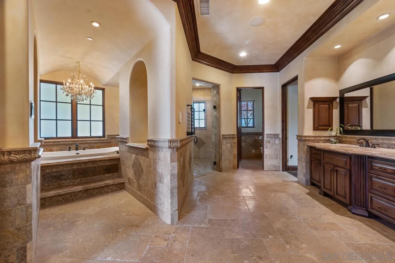 19612 Rangeland Road Ramona, CA 92065 - Photo 47 of 65 a large room with a large window and stainless steel appliances