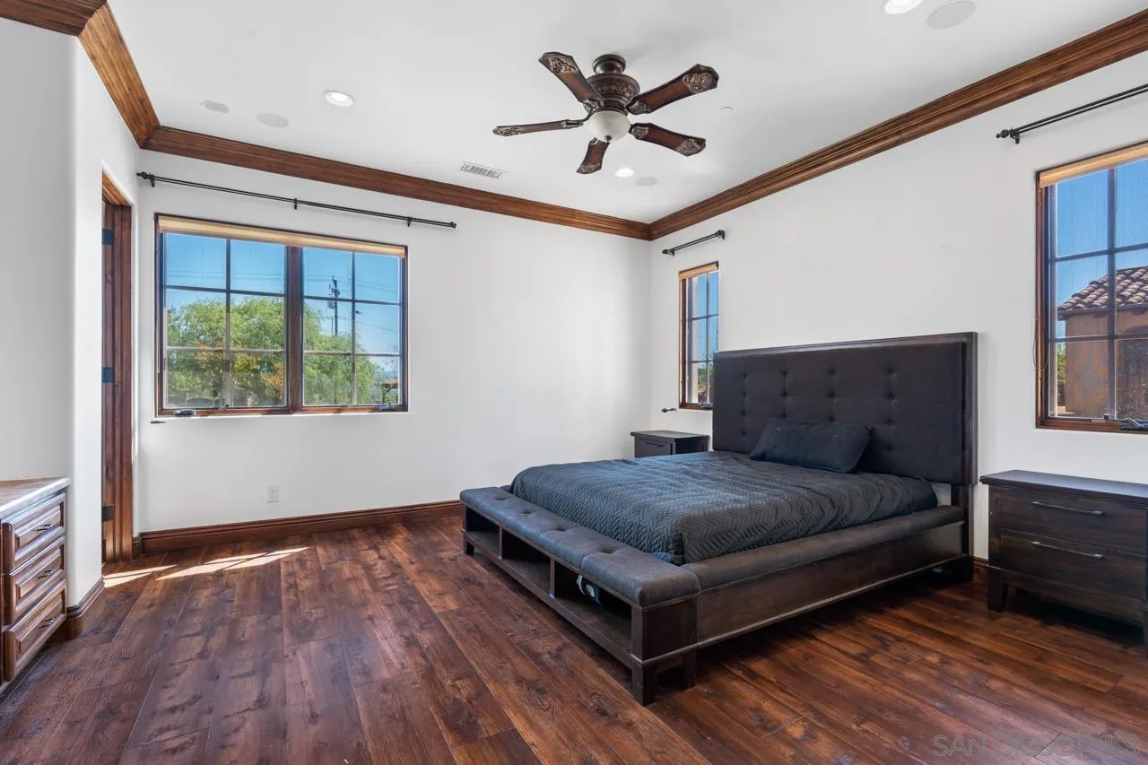19612 Rangeland Road Ramona, CA 92065 - Photo 53 of 65 a living room with a bed furniture and a large window