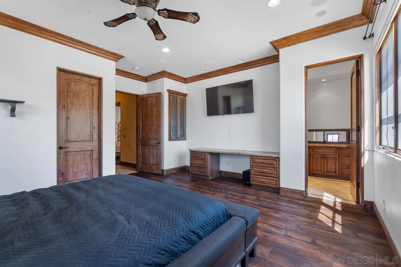 19612 Rangeland Road Ramona, CA 92065 - Photo 54 of 65 a living room with furniture and a fireplace