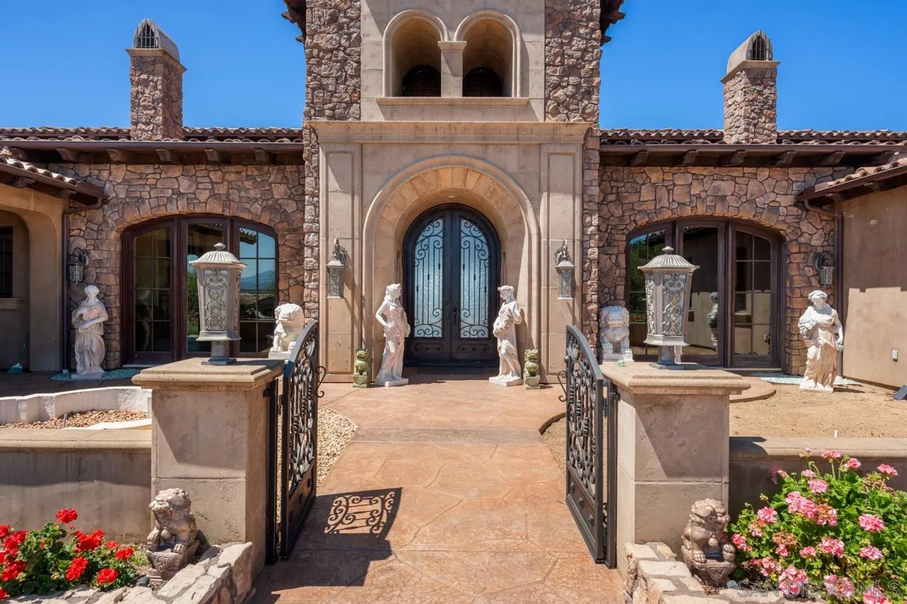 19612 Rangeland Road Ramona, CA 92065 - Photo 10 of 65 a view of a building with many windows