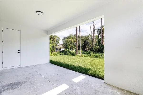 a view of a yard with an outdoor space