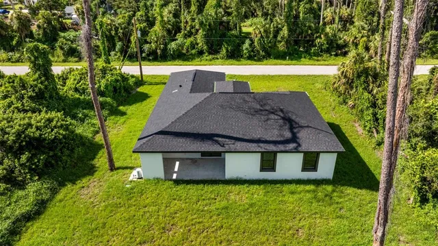 a view of a garden with an outdoor space