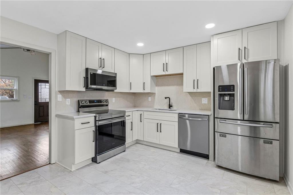 3507 Ruysser Road Kansas City, MO 64137 - Photo 4 of 33 Gallery Image 4