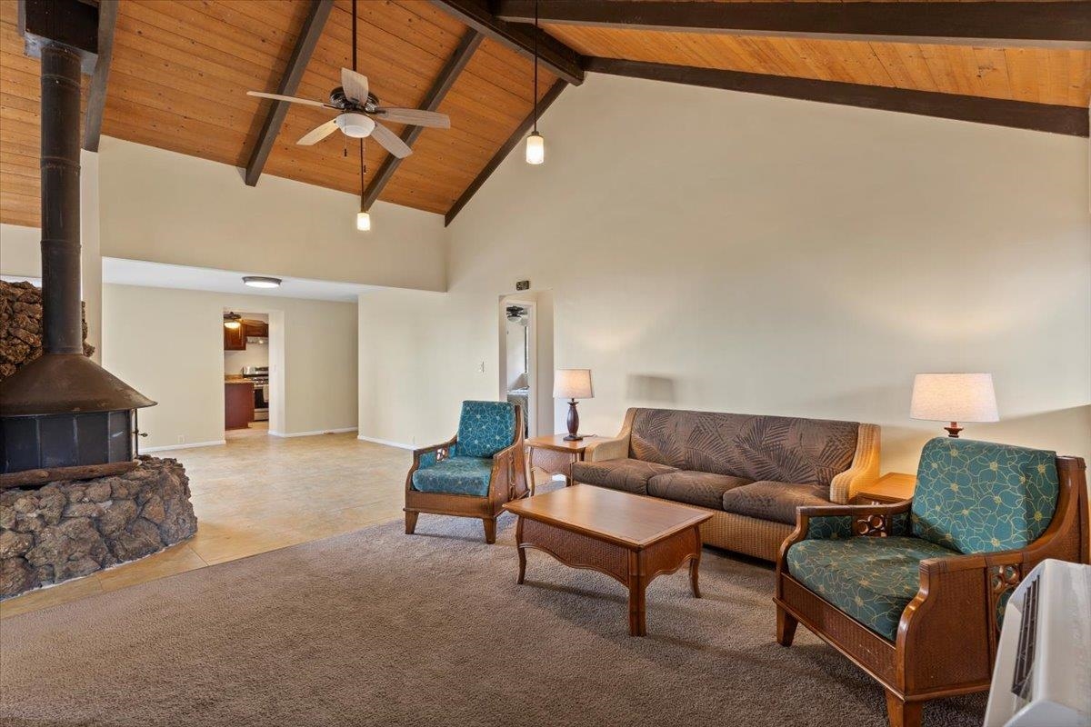 248 Piliwale Road Kula, HI 96790 - Photo 13 of 22 a living room with furniture and a rug