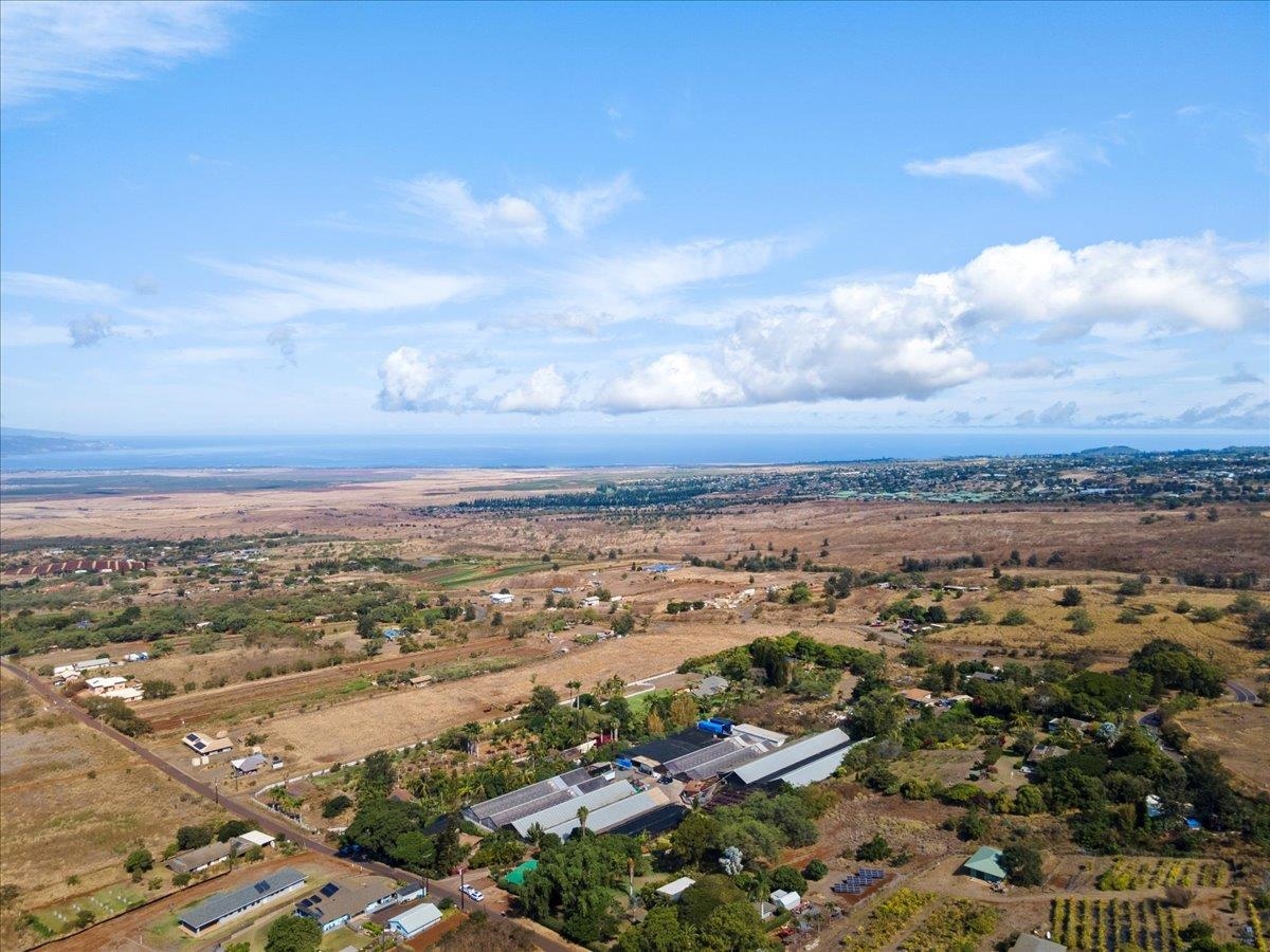 248 Piliwale Road Kula, HI 96790 - Photo 22 of 22 an aerial view of residential building and ocean view in back