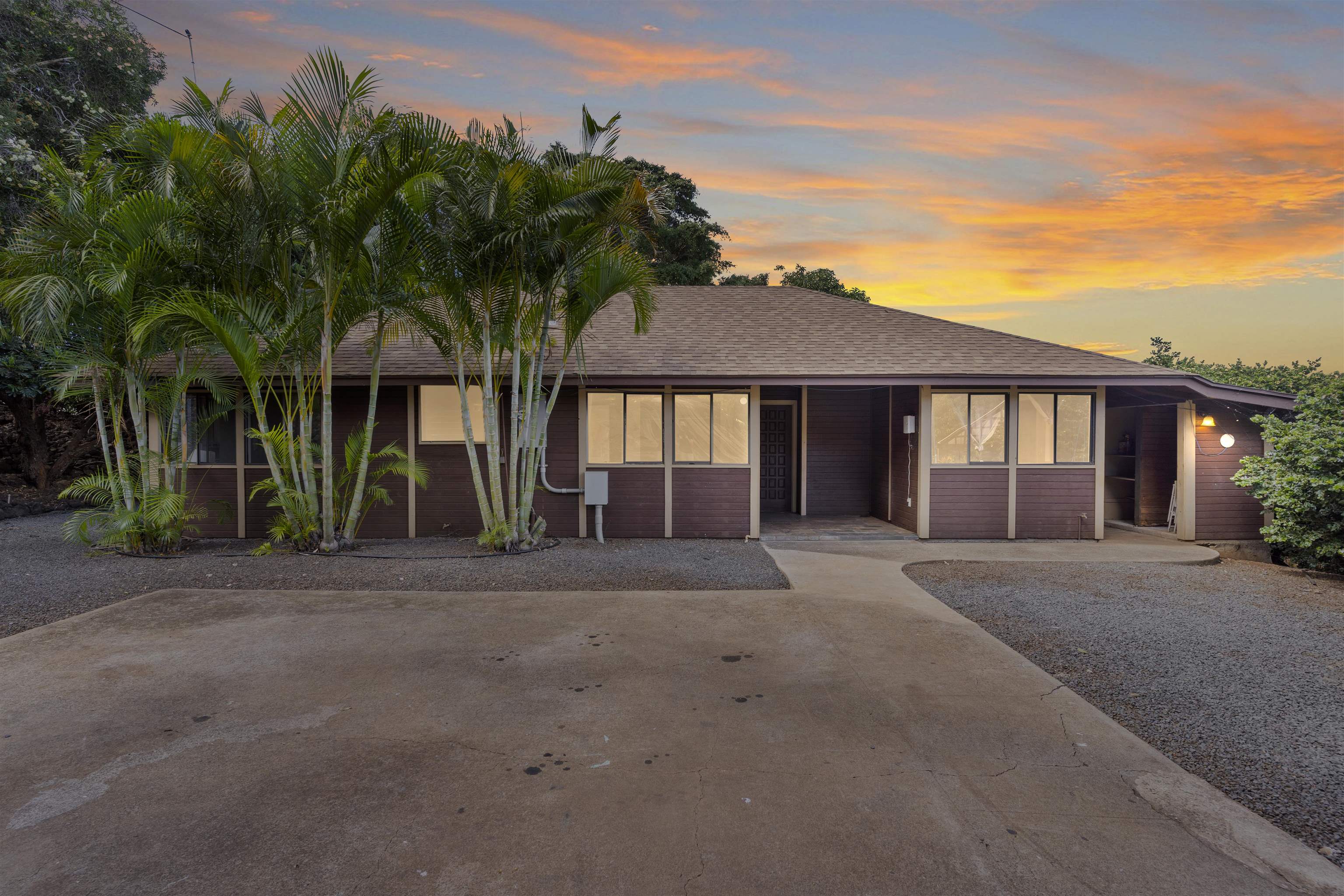 248 Piliwale Road Kula, HI 96790 - Photo 5 of 22 a front view of a house with a garden