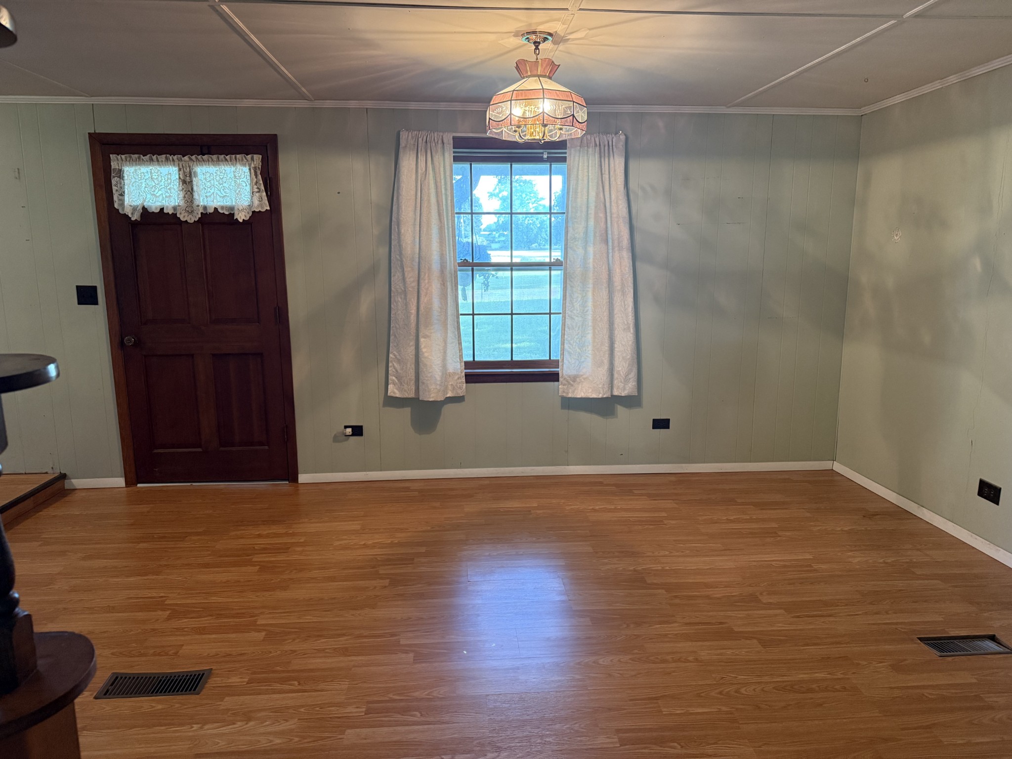 498 Ralph Broadrick Road Normandy, TN 37360 - Photo 5 of 17 a view of an empty room with window and wooden floor