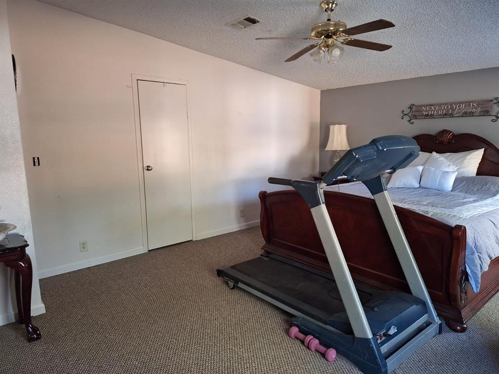 14899 Southwest 92nd Way Lake Butler, FL 32054 - Photo 17 of 39 a room with gym equipment