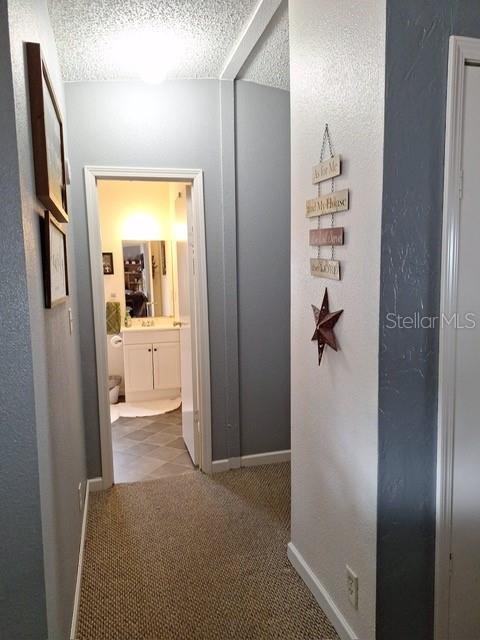 14899 Southwest 92nd Way Lake Butler, FL 32054 - Photo 23 of 39 a view of a hallway with wooden shelves