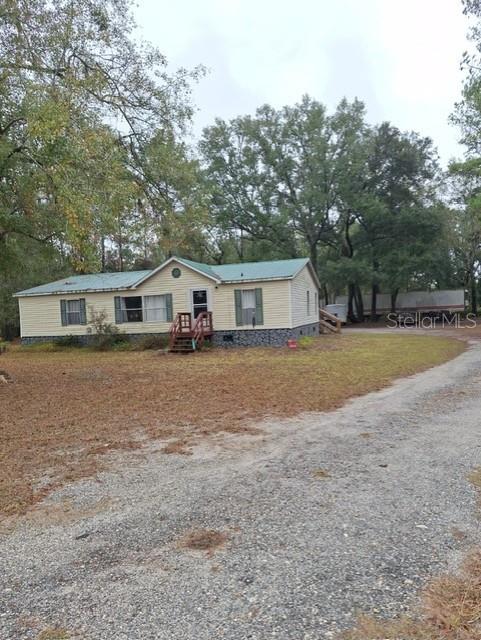 14899 Southwest 92nd Way Lake Butler, FL 32054 - Photo 33 of 39 a house view with a outdoor space