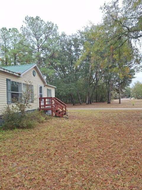 14899 Southwest 92nd Way Lake Butler, FL 32054 - Photo 36 of 39 a view of house with outdoor space