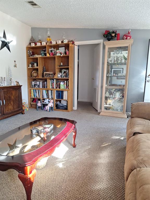 14899 Southwest 92nd Way Lake Butler, FL 32054 - Photo 5 of 39 a room with toys and flowers