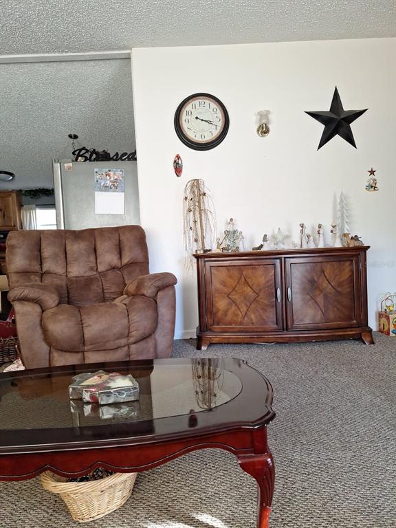 14899 Southwest 92nd Way Lake Butler, FL 32054 - Photo 7 of 39 a living room with furniture and a table