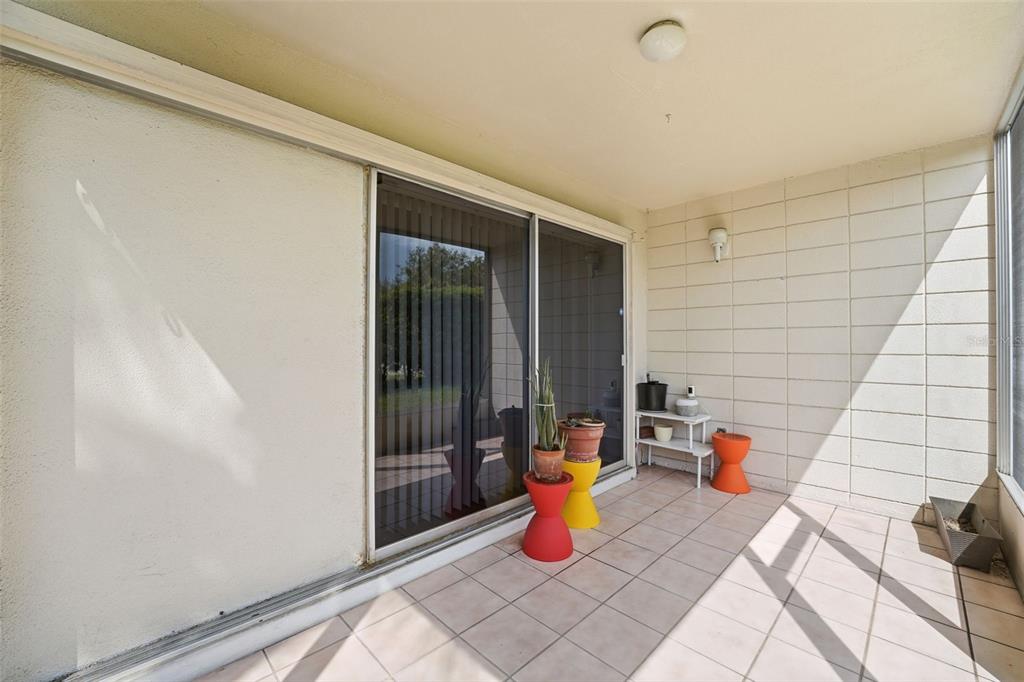 3900 Roxane Boulevard, Unit 10A Sarasota, FL 34235 - Photo 25 of 30 a view of a outdoor space with a barbeque