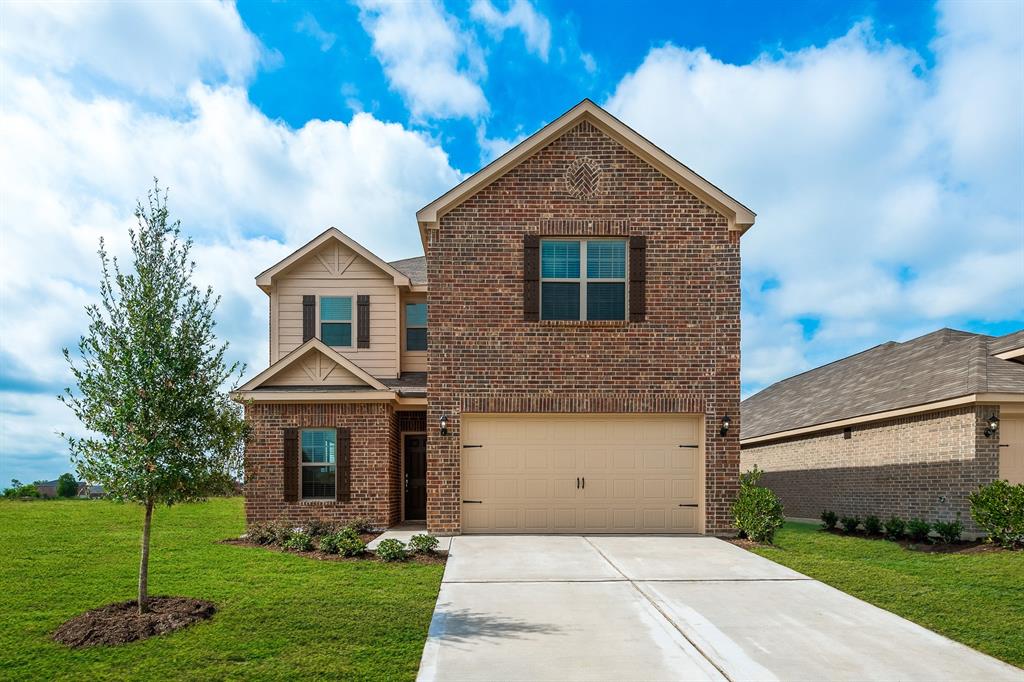 921 Primrose Drive Sanger, TX 76266 - Photo 1 of 1 a front view of a house with a yard