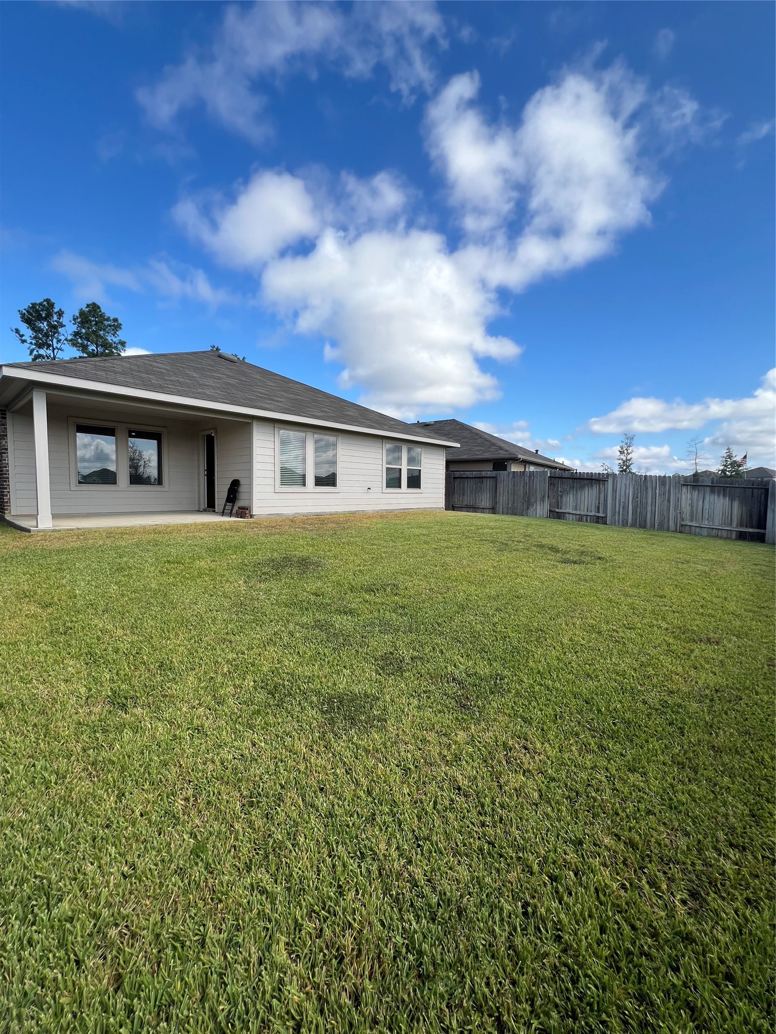 21354 Owl Road New Caney, TX 77357 - Photo 11 of 11 Large backyard, covered patio, and no back neighbors.
