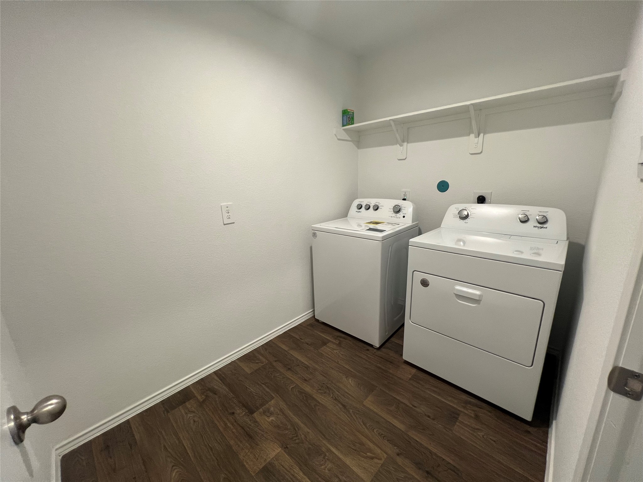 21354 Owl Road New Caney, TX 77357 - Photo 6 of 11 a utility room with dryer and washer