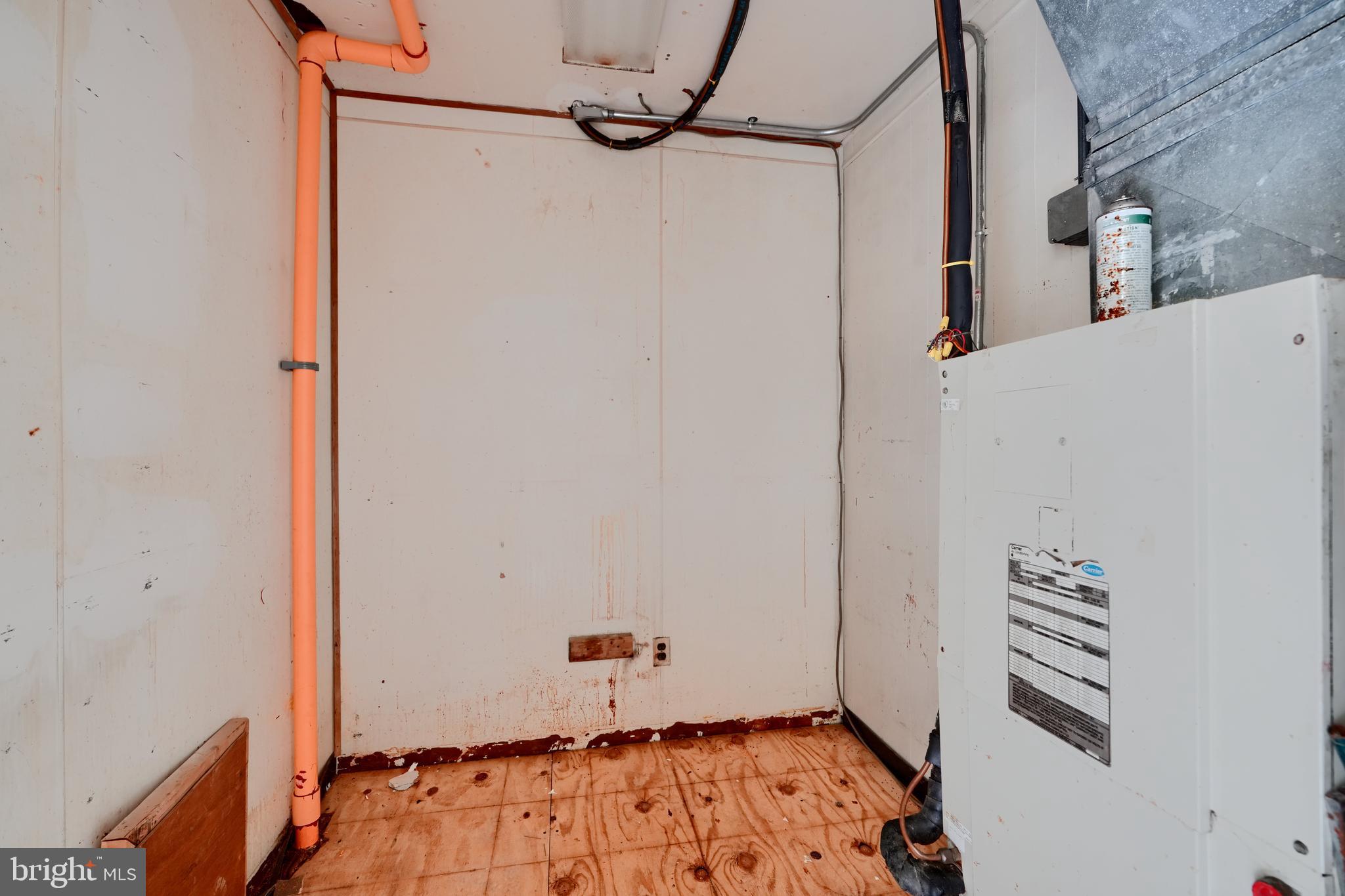 116 Callender Street Baltimore, MD 21201 - Photo 11 of 47 a view of small space with racks on the wall