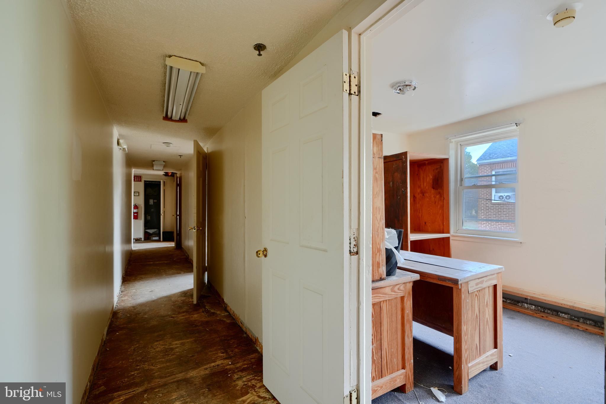 116 Callender Street Baltimore, MD 21201 - Photo 20 of 47 a view of a hallway with workspace