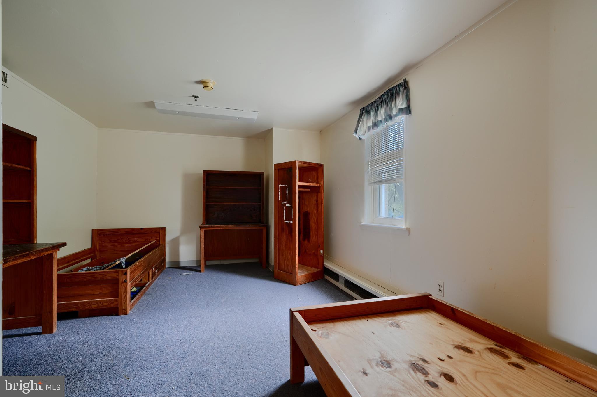 116 Callender Street Baltimore, MD 21201 - Photo 28 of 47 a view of a livingroom with furniture and closet