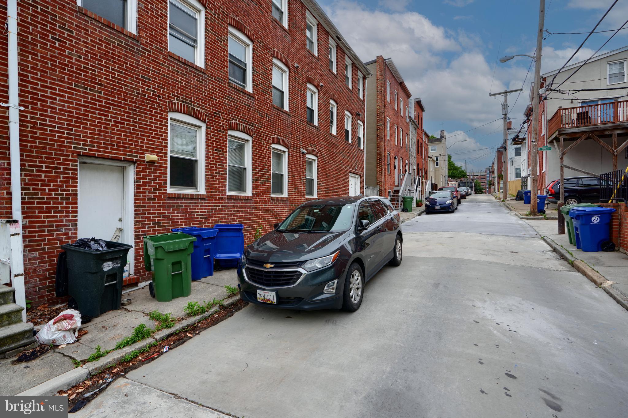 116 Callender Street Baltimore, MD 21201 - Photo 3 of 47 a car parked in front of a building