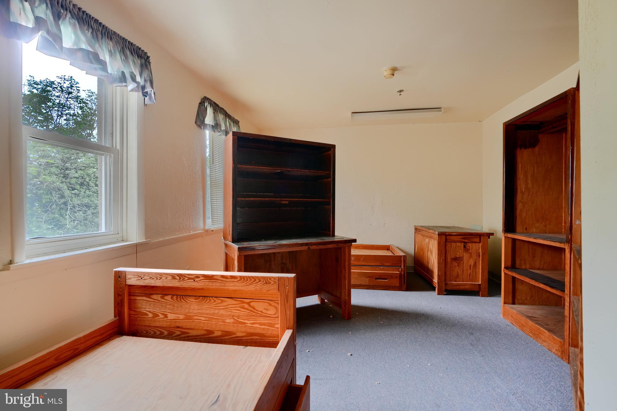 116 Callender Street Baltimore, MD 21201 - Photo 35 of 47 a room with furniture and a window