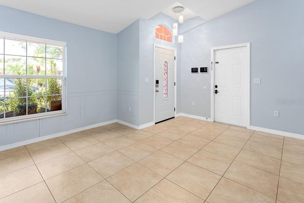 4907 Carlyle Road Tampa, FL 33615 - Photo 7 of 29 a view of an empty room and window