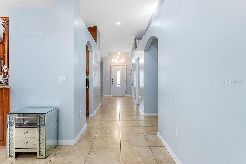 4907 Carlyle Road Tampa, FL 33615 - Photo 8 of 29 a view of a hallway with entryway and a window