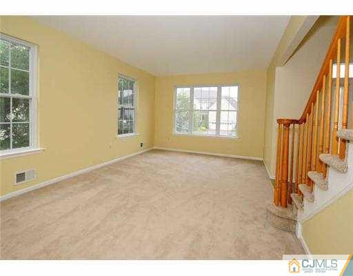 34 Lexington Road Monmouth Junction, NJ 08852 - Photo 2 of 17 a view of an empty room with a window