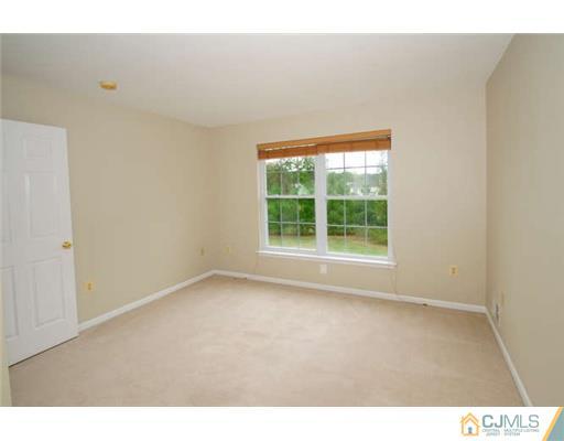 34 Lexington Road Monmouth Junction, NJ 08852 - Photo 11 of 17 a view of an empty room with a window