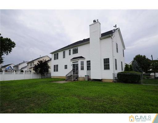 34 Lexington Road Monmouth Junction, NJ 08852 - Photo 16 of 17 a view of a house with a yard