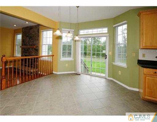 34 Lexington Road Monmouth Junction, NJ 08852 - Photo 5 of 17 a view of an empty room with a window