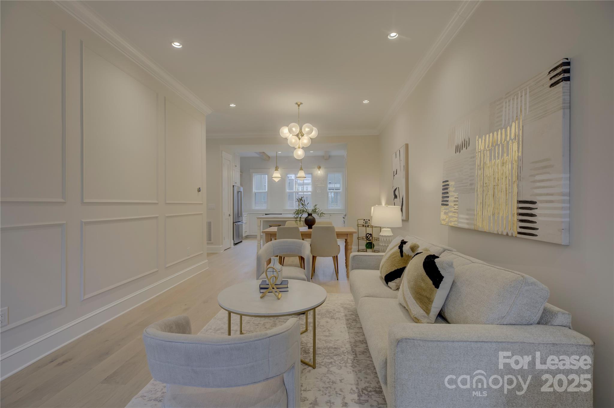 3015 Pinehurst Place Charlotte, NC 28209 - Photo 12 of 31 a living room with couches and kitchen view with wooden floor