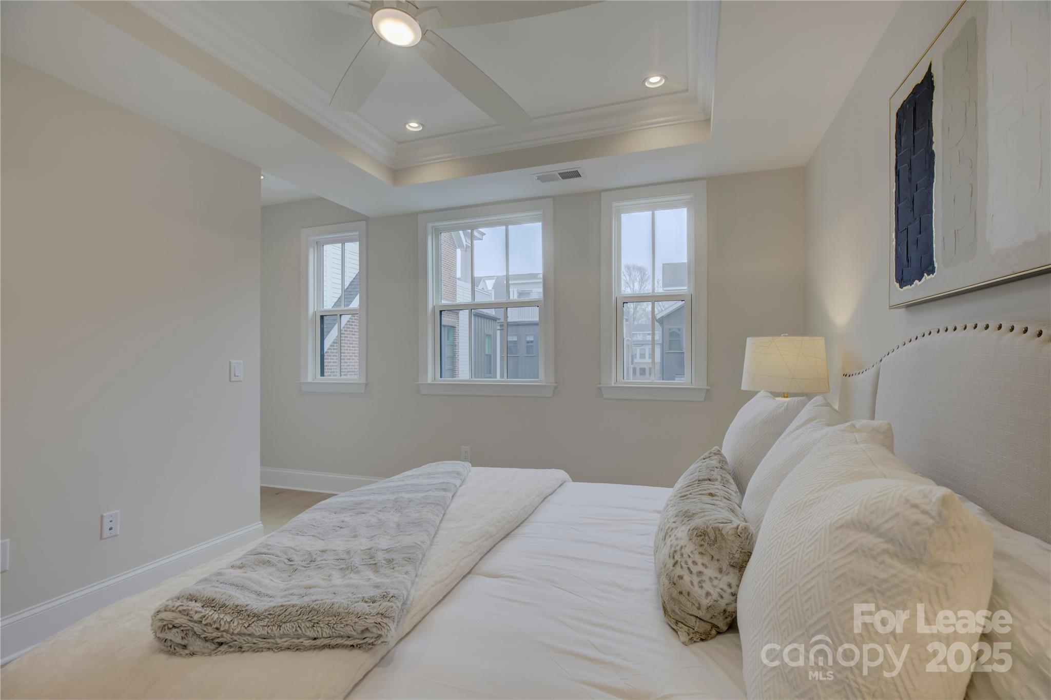 3015 Pinehurst Place Charlotte, NC 28209 - Photo 15 of 31 a bedroom with a bed and a window