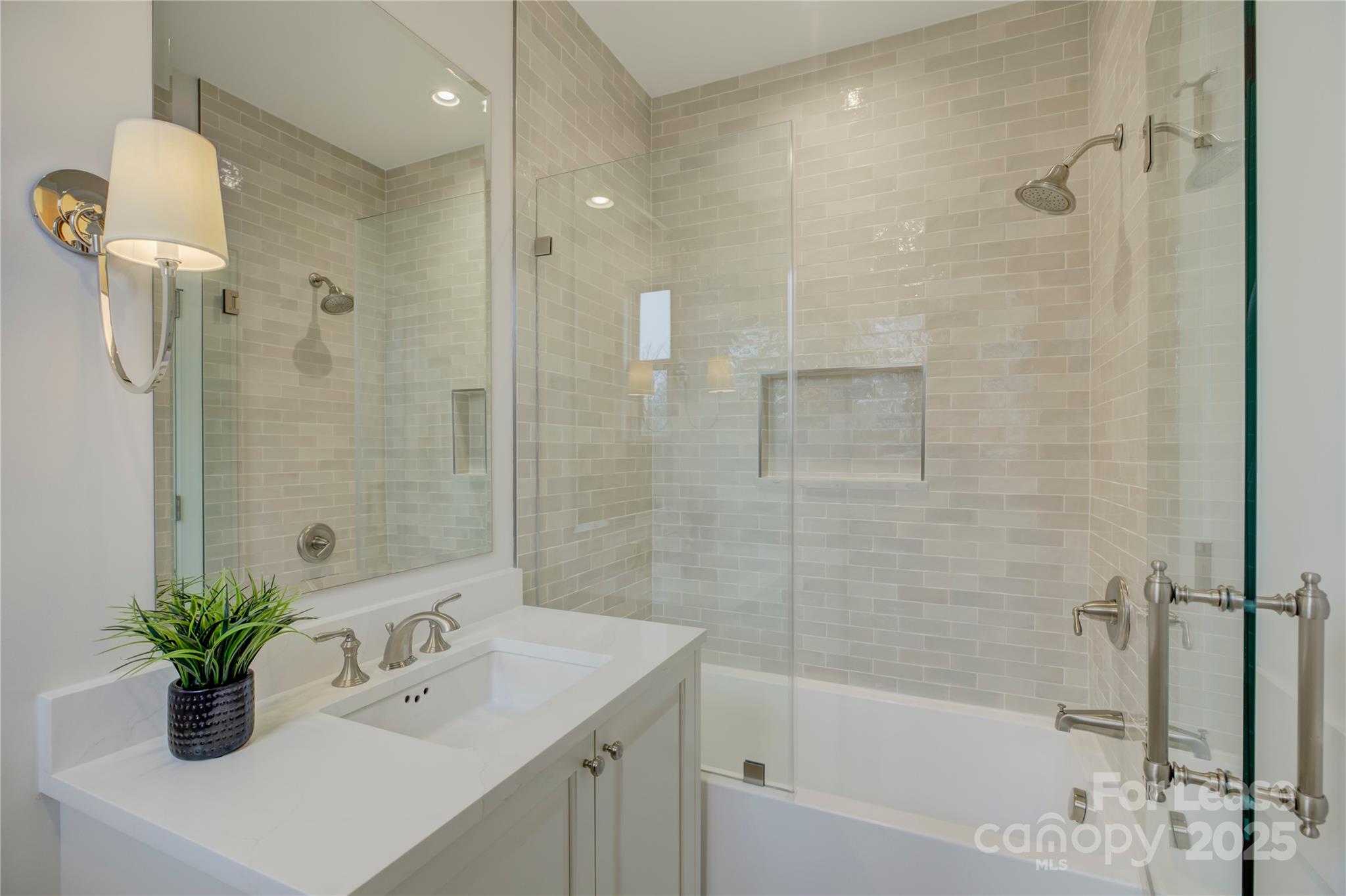 3015 Pinehurst Place Charlotte, NC 28209 - Photo 21 of 31 a bathroom with a sink and a bathtub