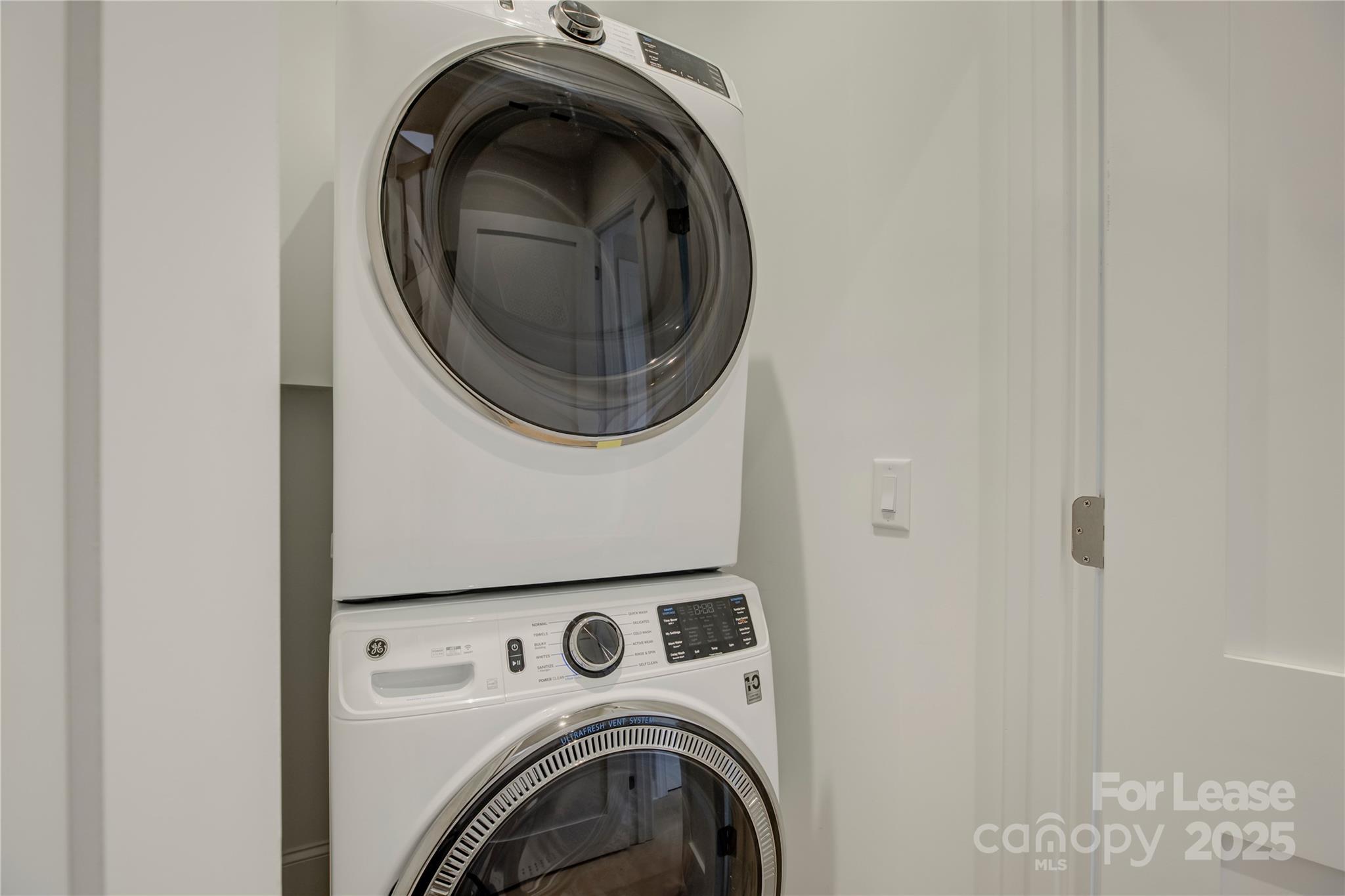 3015 Pinehurst Place Charlotte, NC 28209 - Photo 22 of 31 a utility room with dryer and washer