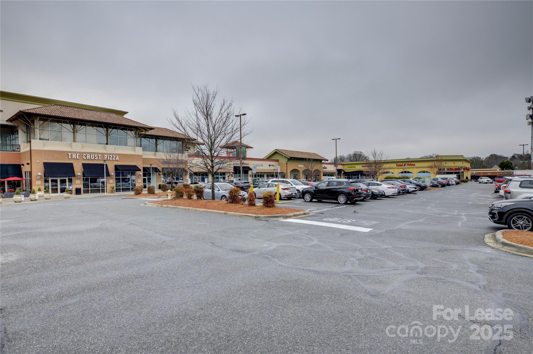 3015 Pinehurst Place Charlotte, NC 28209 - Photo 31 of 31 a cars parked in front of a building