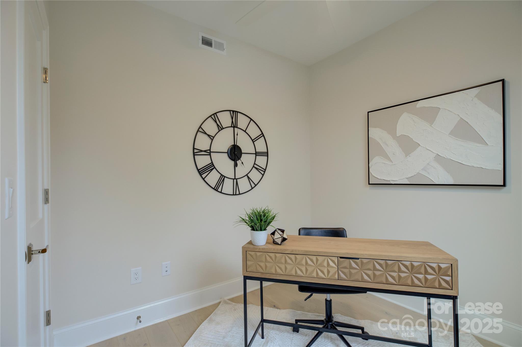 3015 Pinehurst Place Charlotte, NC 28209 - Photo 5 of 31 a workspace with furniture and a window