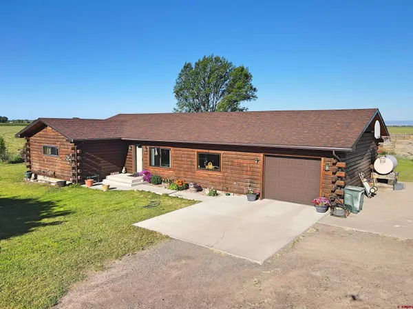 front view of a house with yard