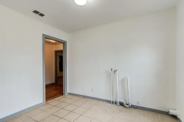 an empty room with a door